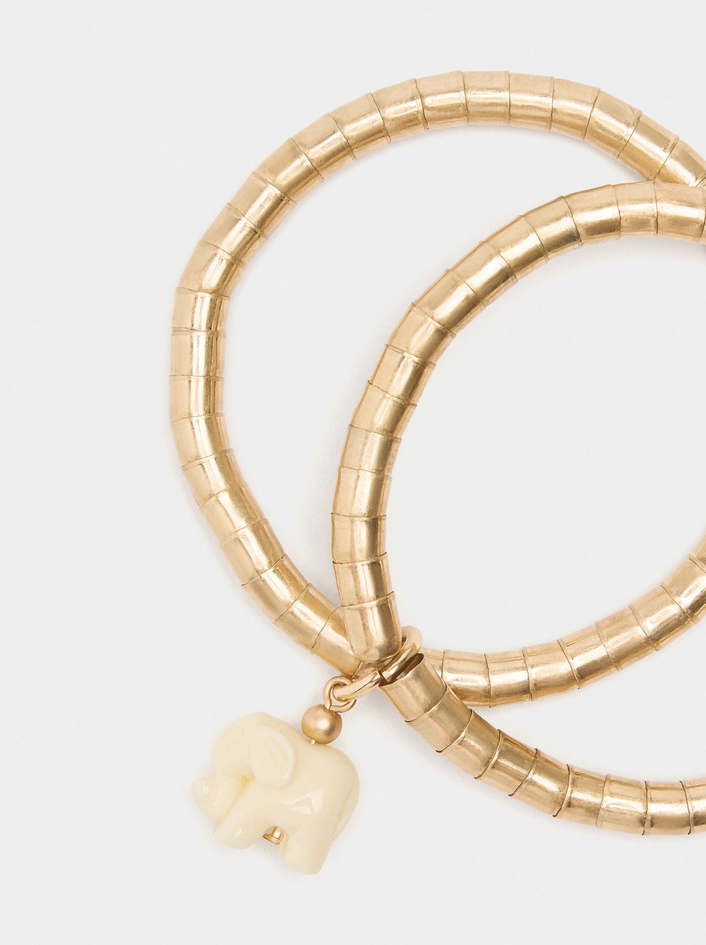 Set Of Elastic Bracelets With Elephant Pendant