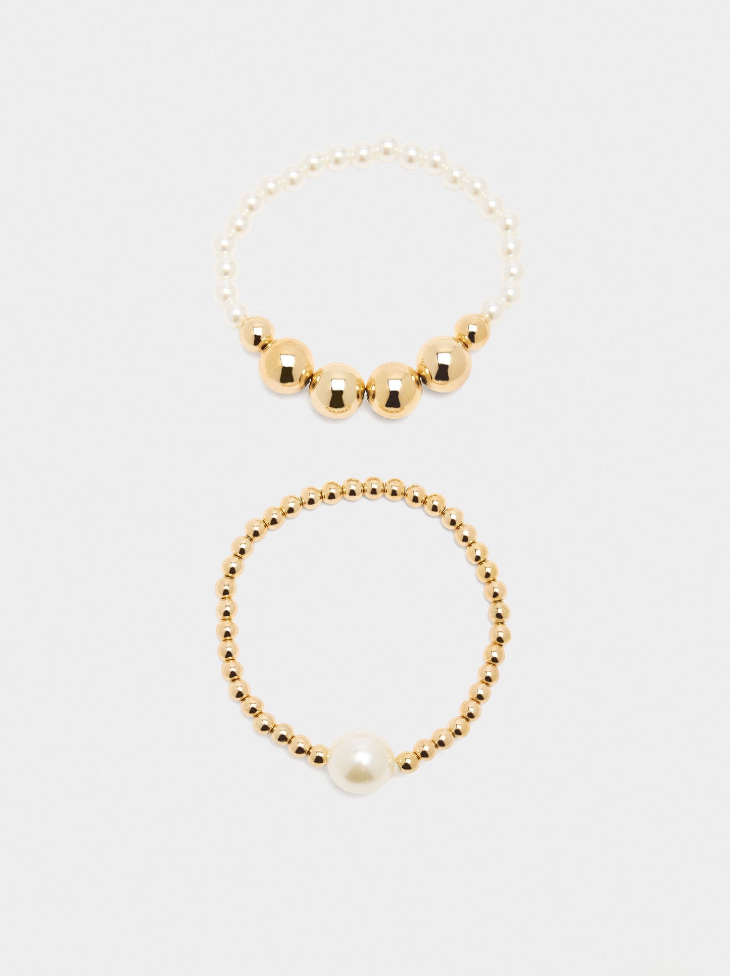 Set Of Elastic Bracelets With Pearls