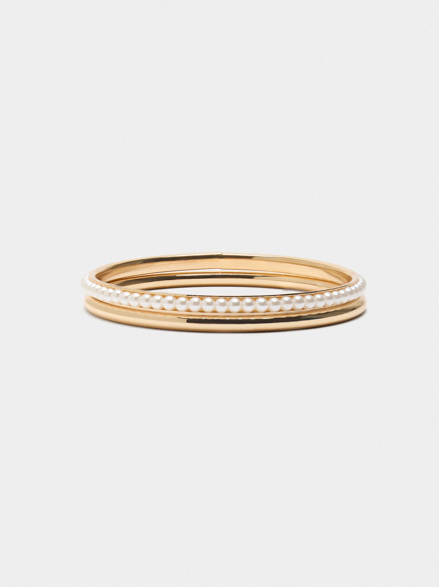 Set Of Rigid Bracelets With Pearls