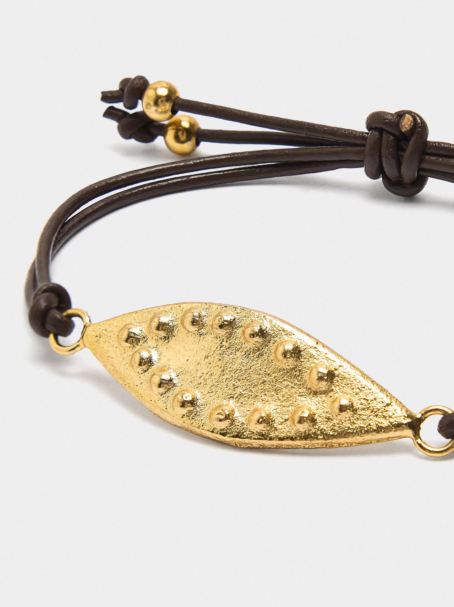 Set Of Bracelets With Leather Cord