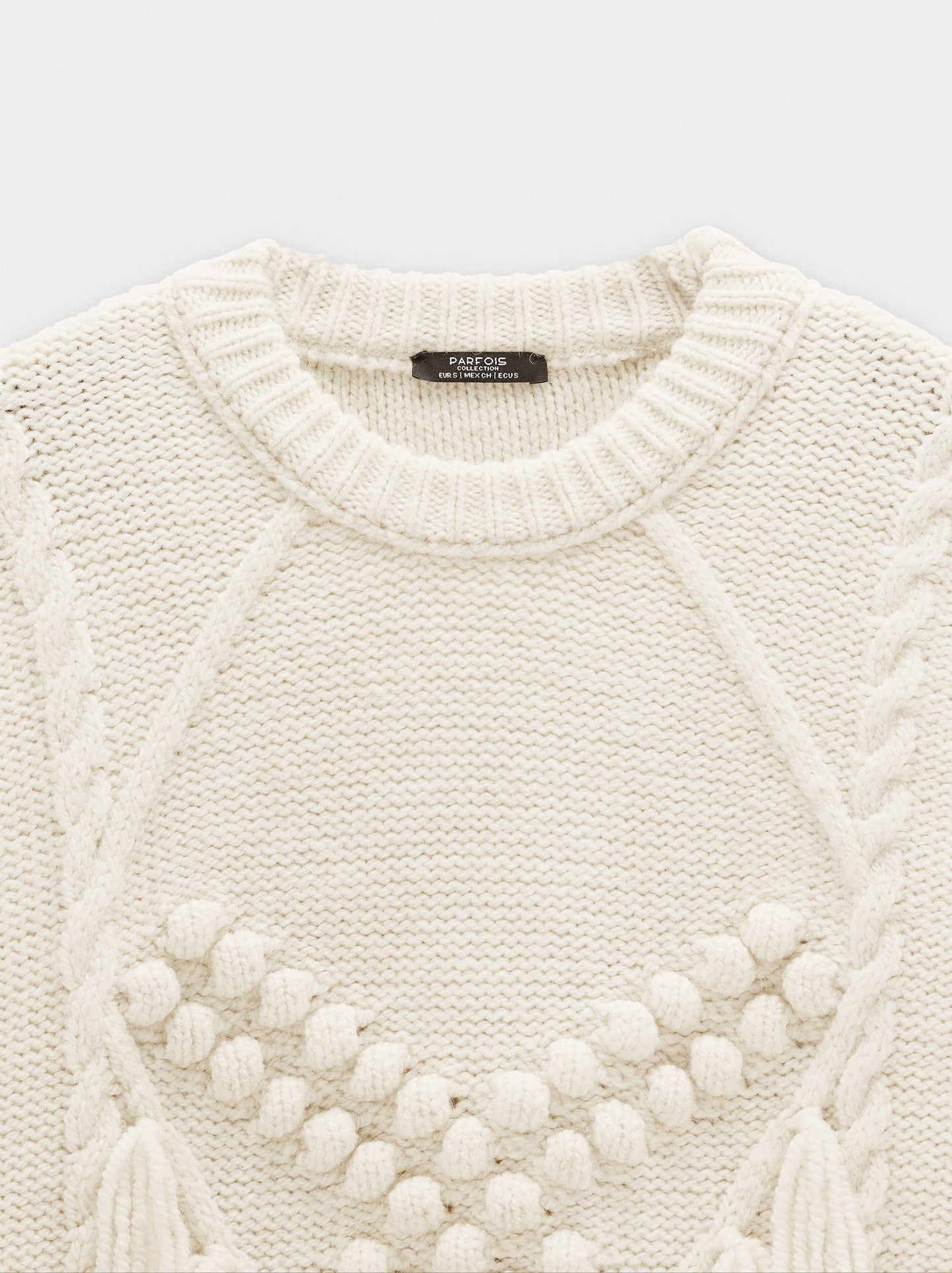 Knit Sweater With Fringes And Reliefs