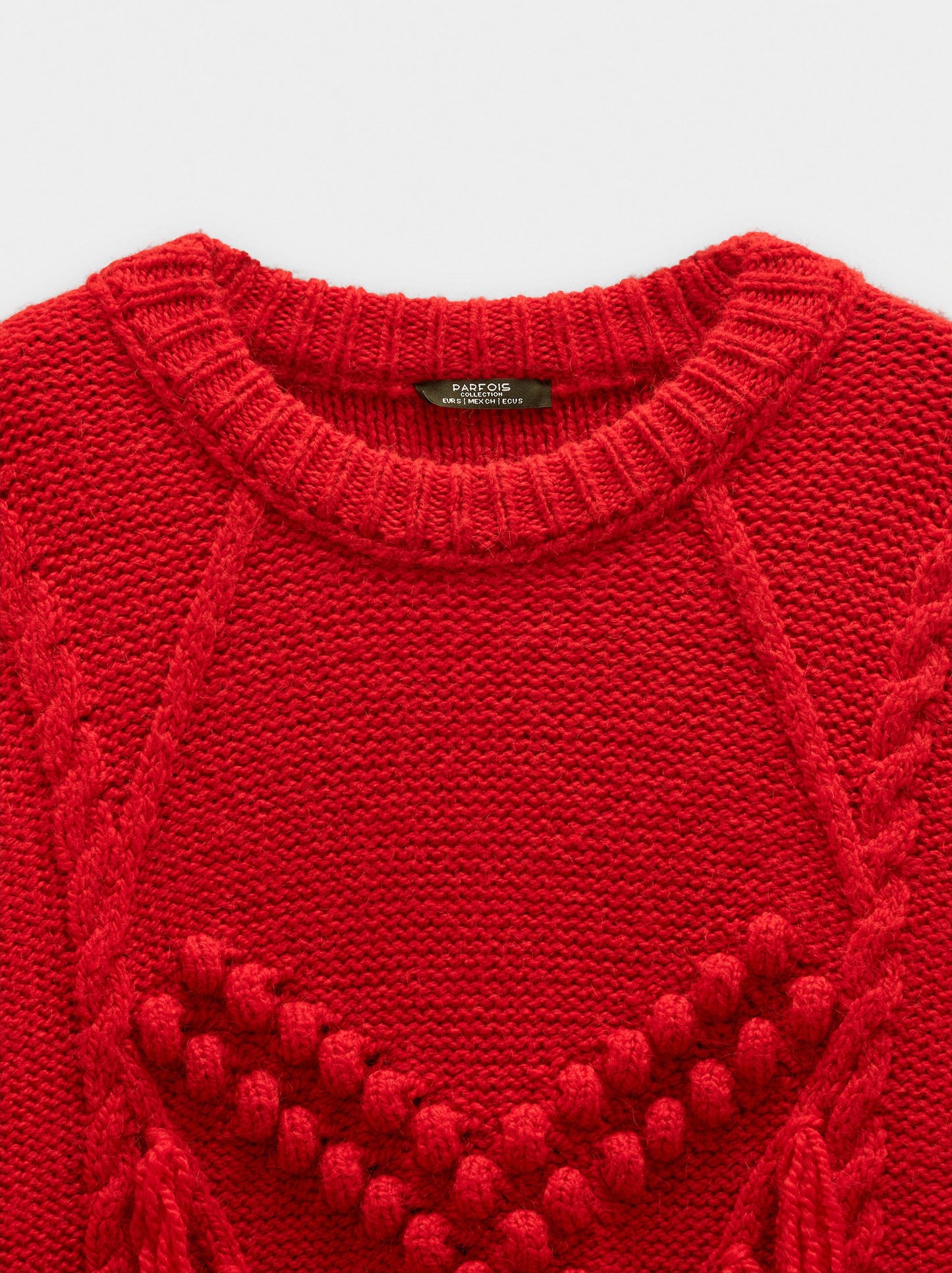 Knit Sweater With Fringes And Reliefs