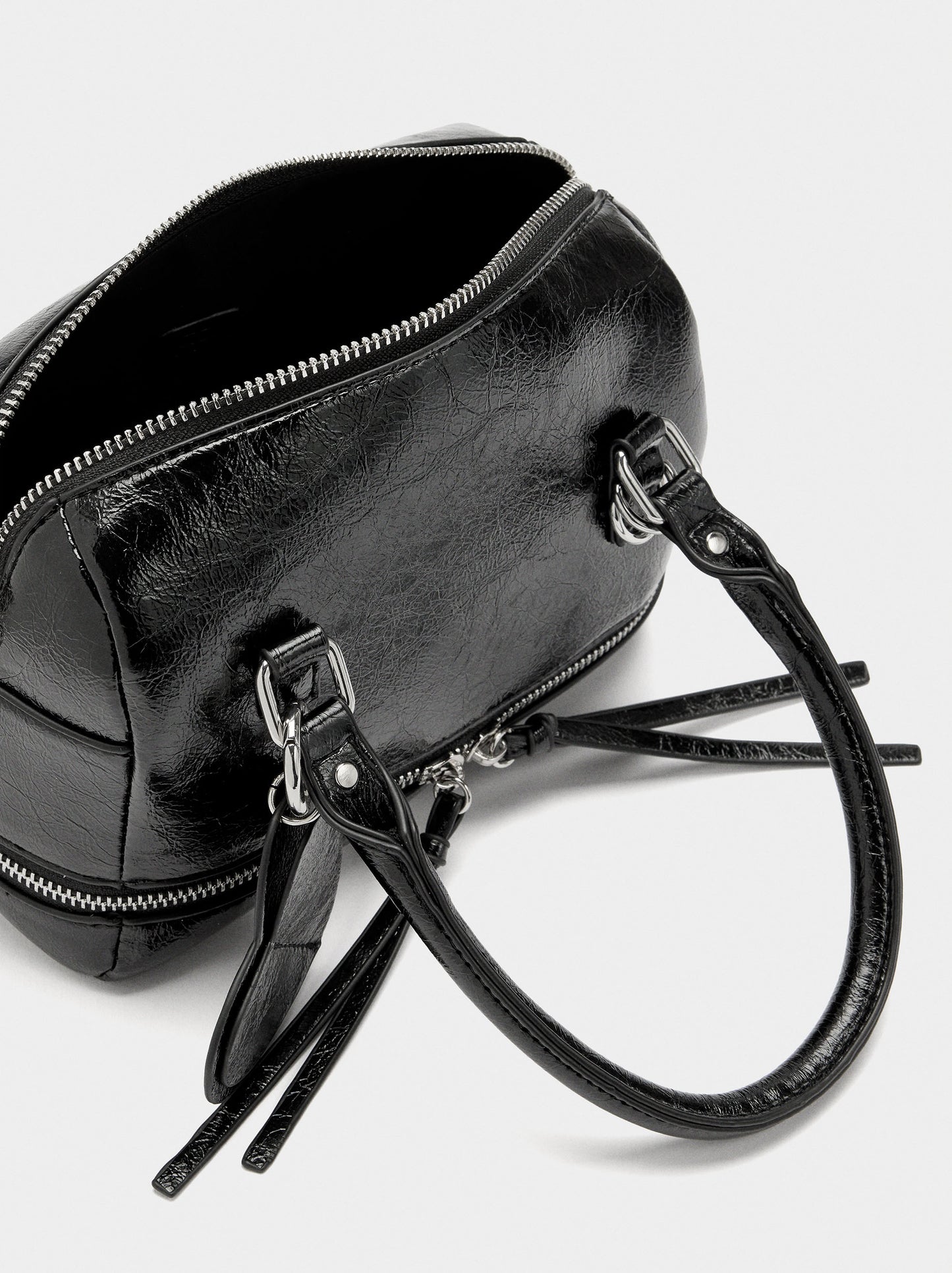 Tote Bag With Cracked Effect And Pendant