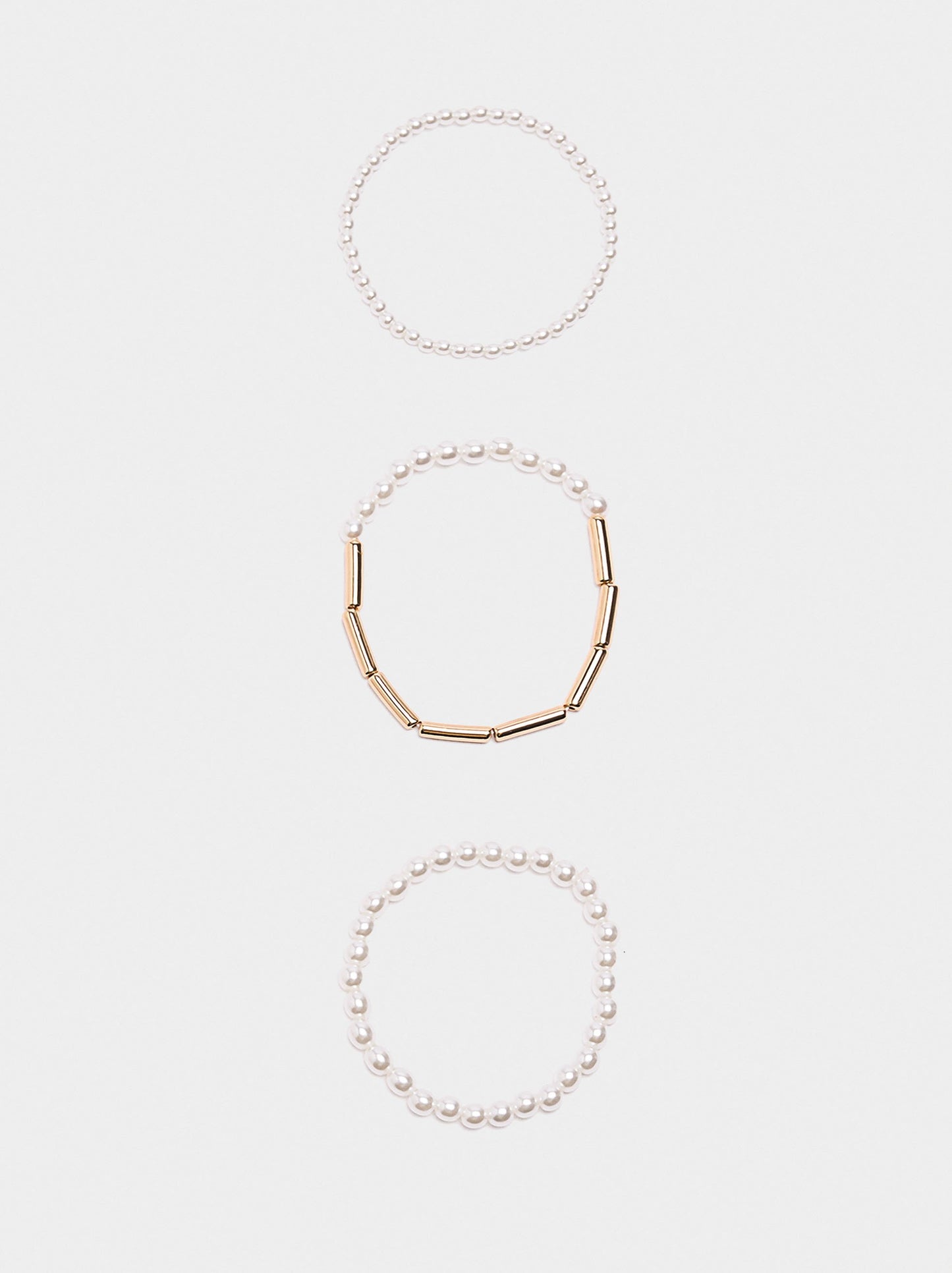 Set Of Elastic Bracelets With Pearls