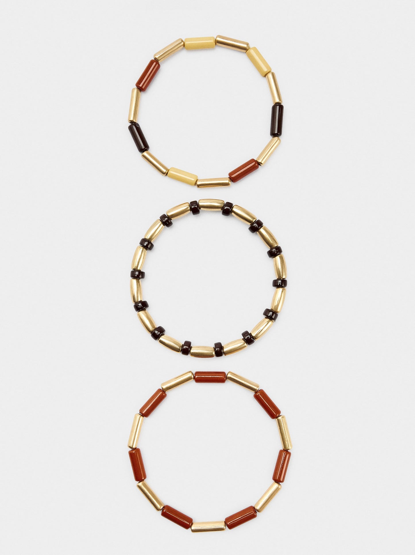 Set Of Elastic Bracelets With Cylindrical Beads