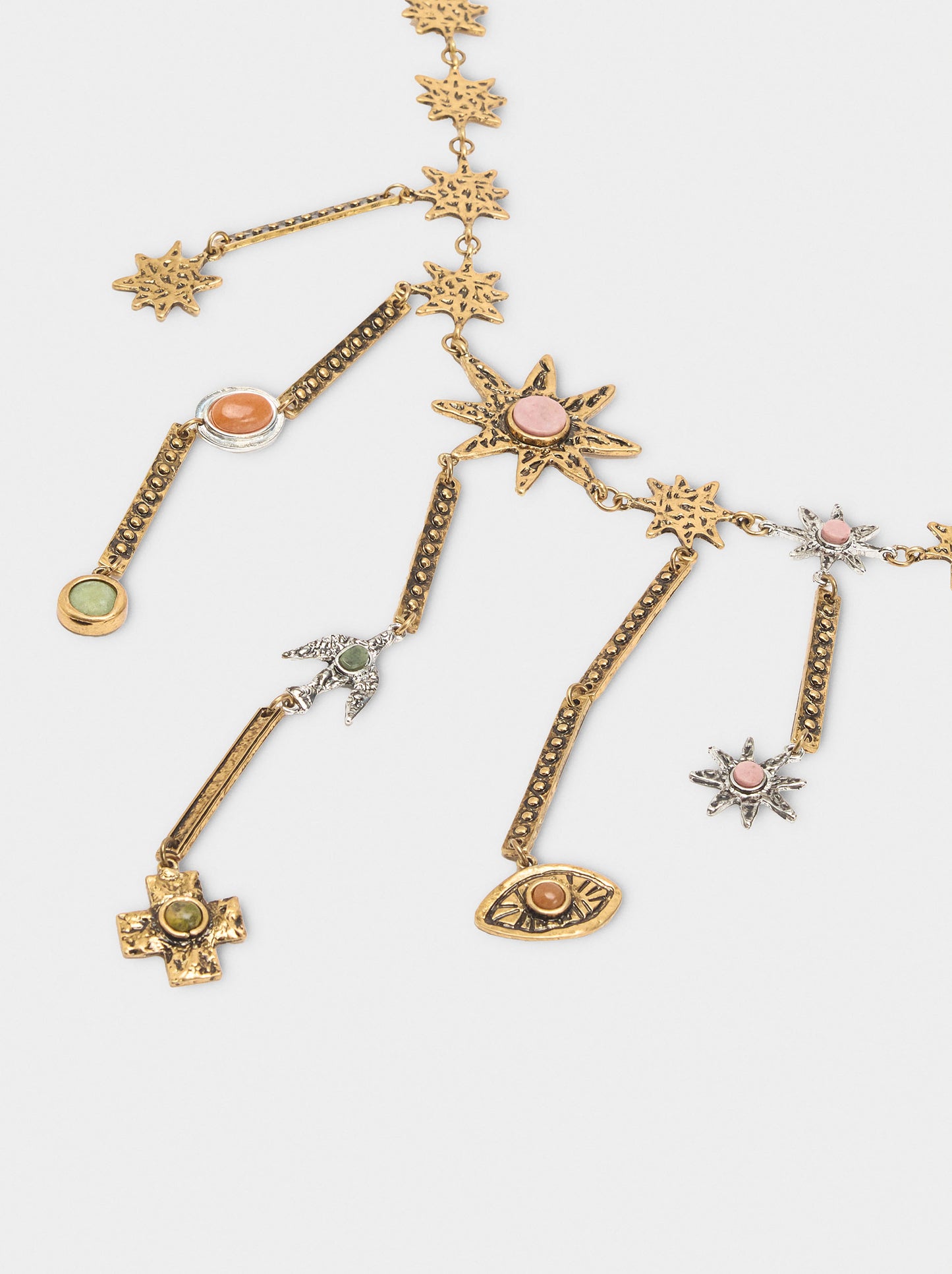 Necklace With Star Pendants Hanging From Bars