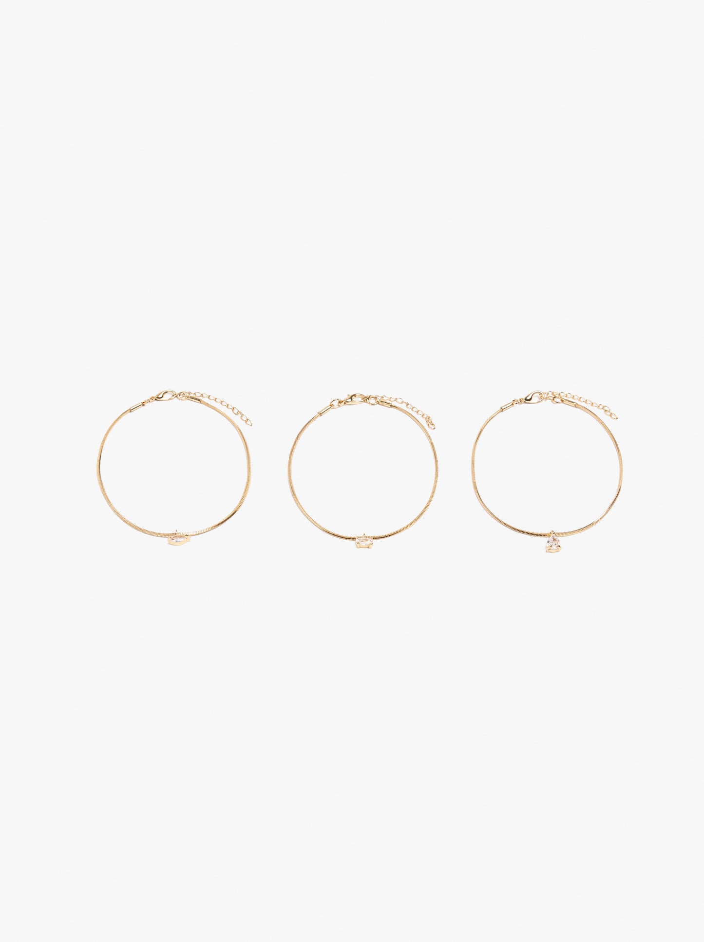 Set Of Bracelets With Zirconia Pendants