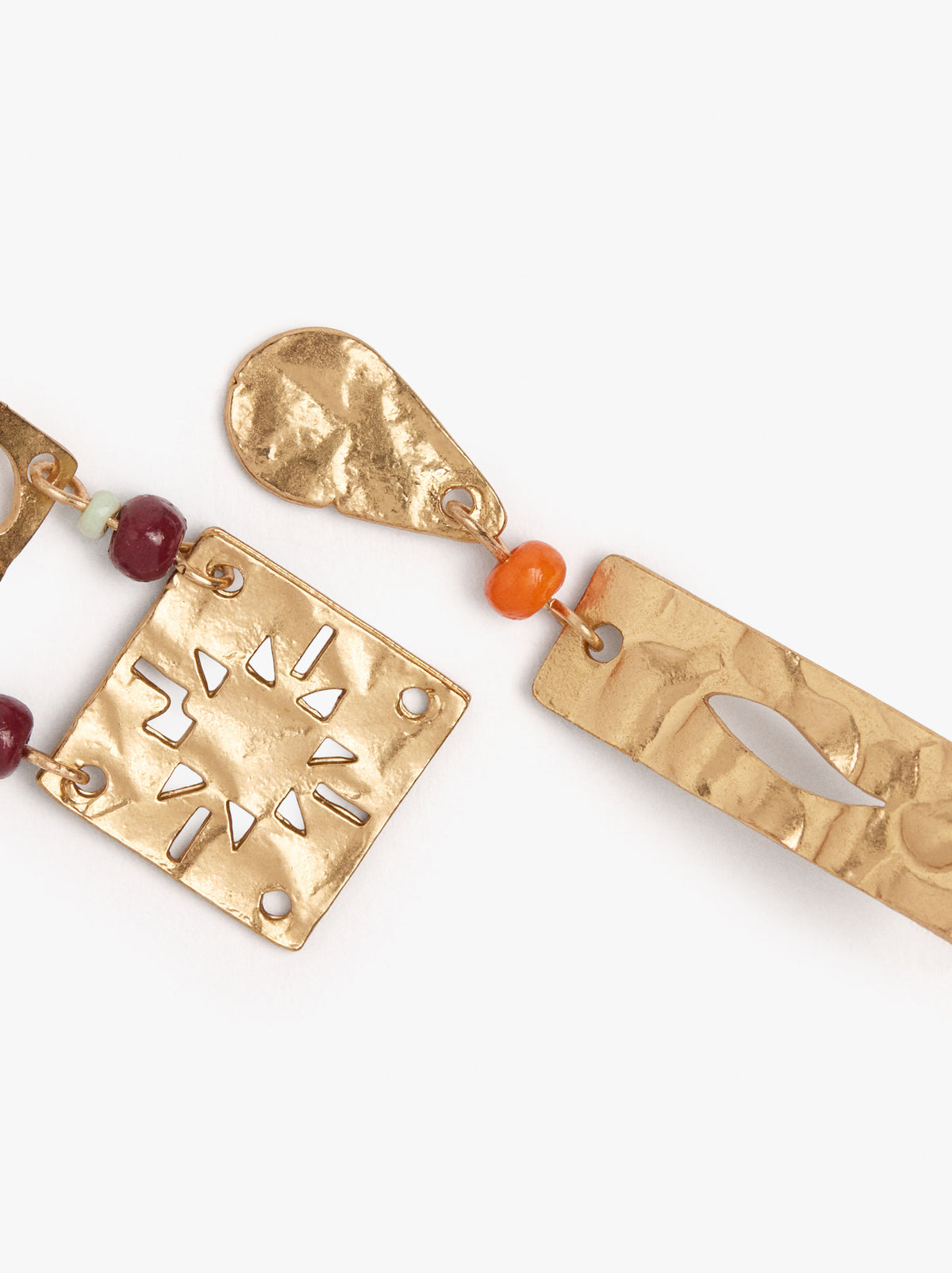 Asymmetric Earrings With Perforated Plates