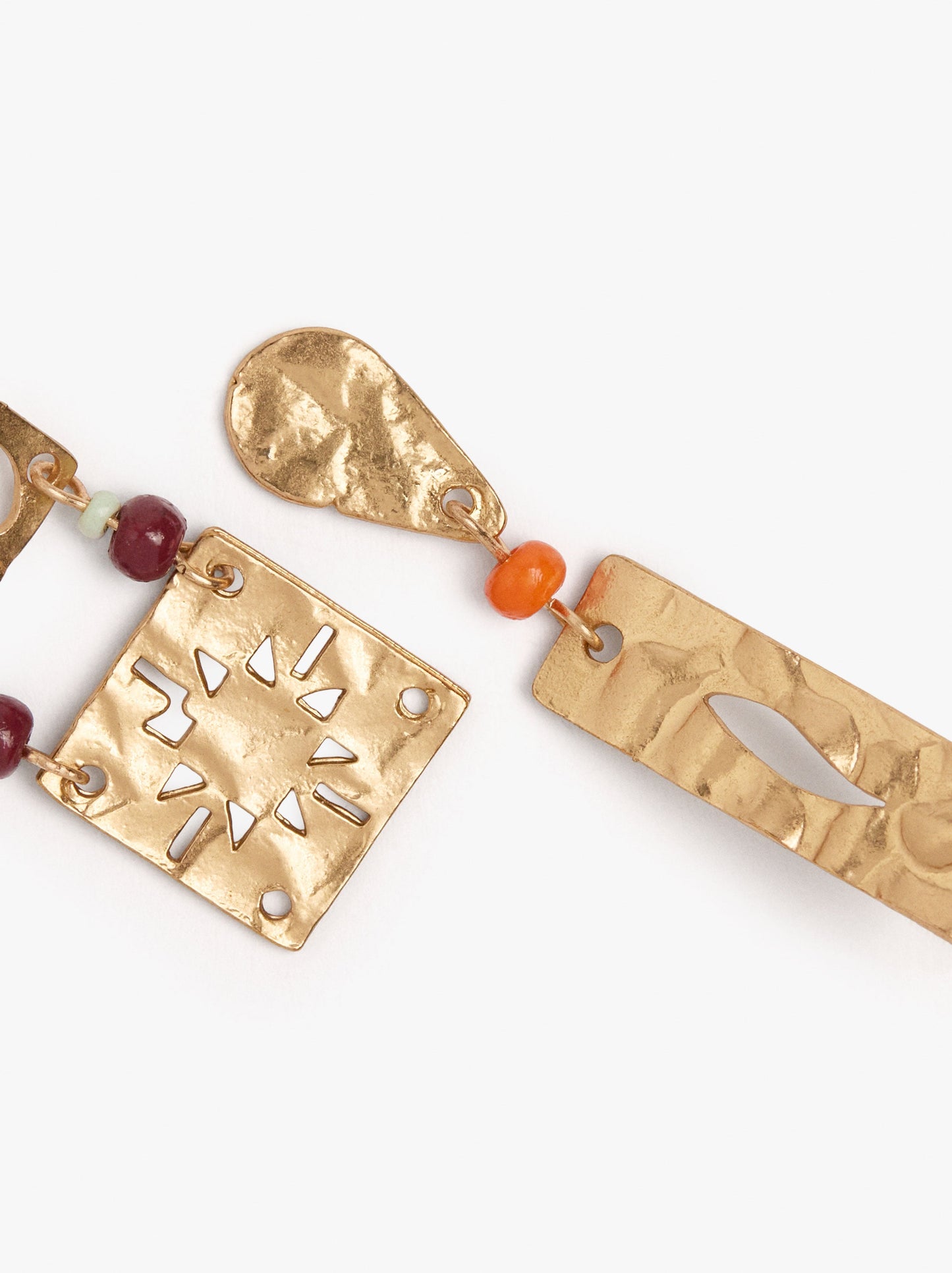 Asymmetric Earrings With Perforated Plates