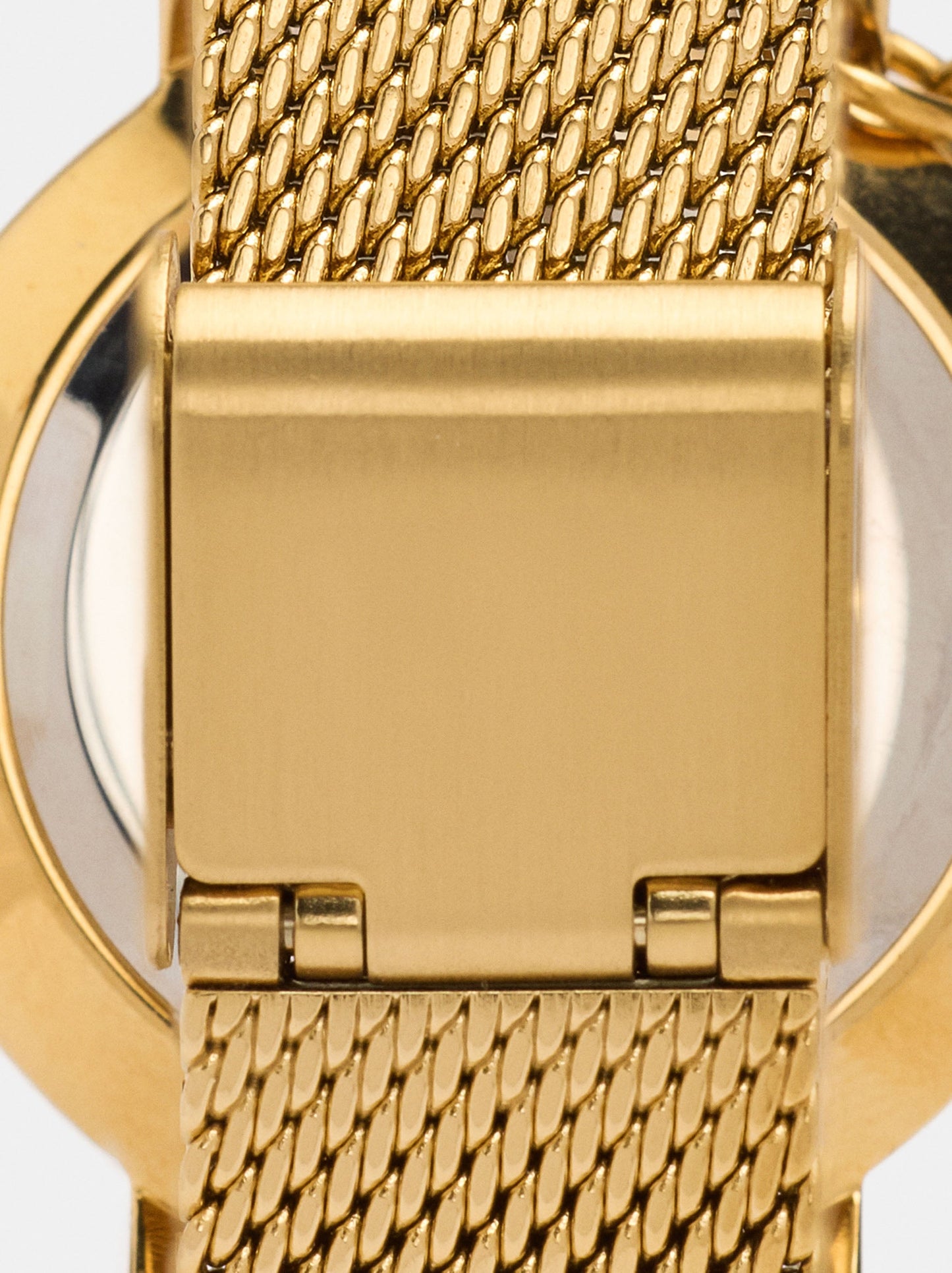 Round Watch With A Steel Mesh Strap And Charm