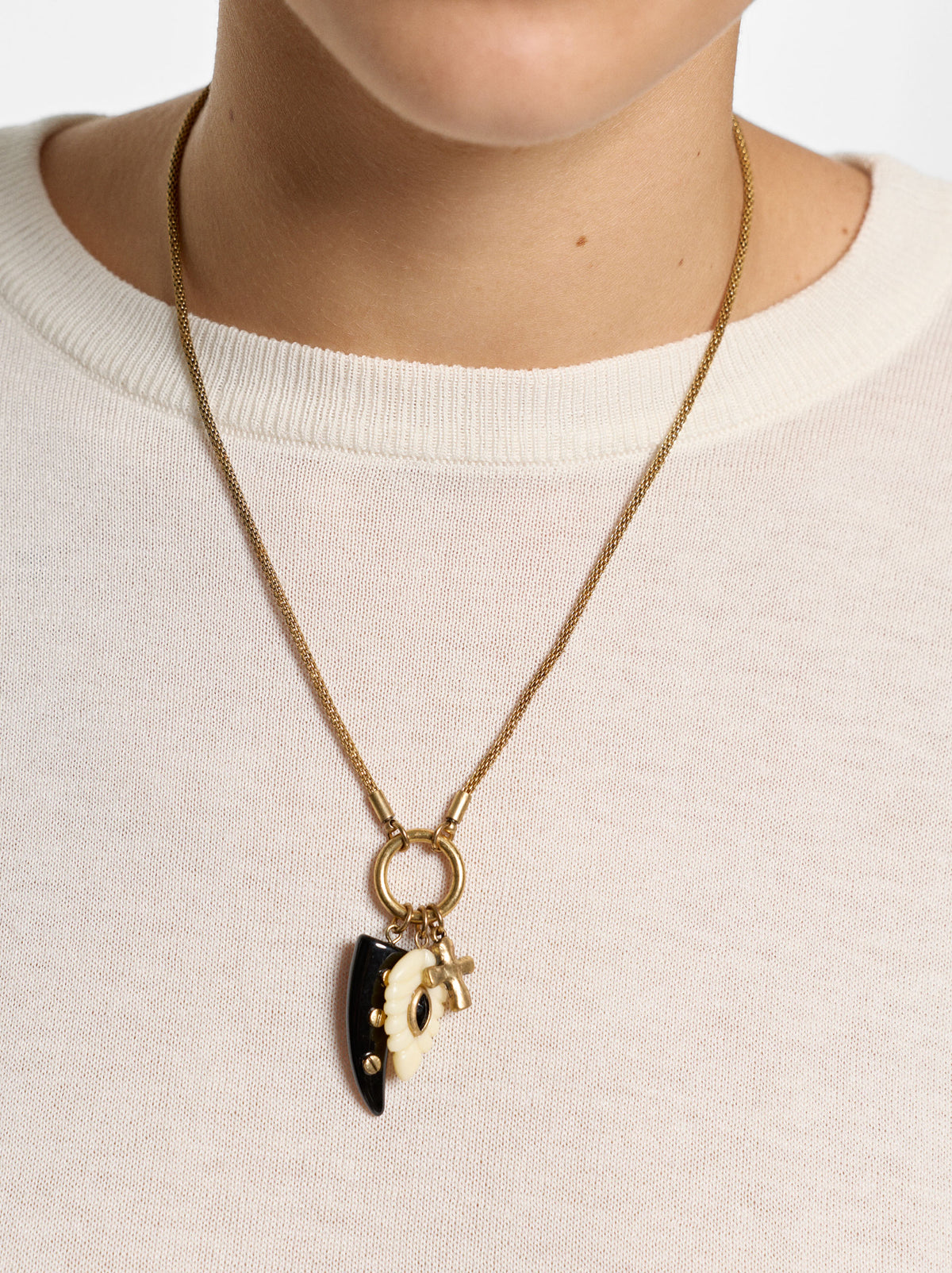 Necklace With Horn And Cross Pendant