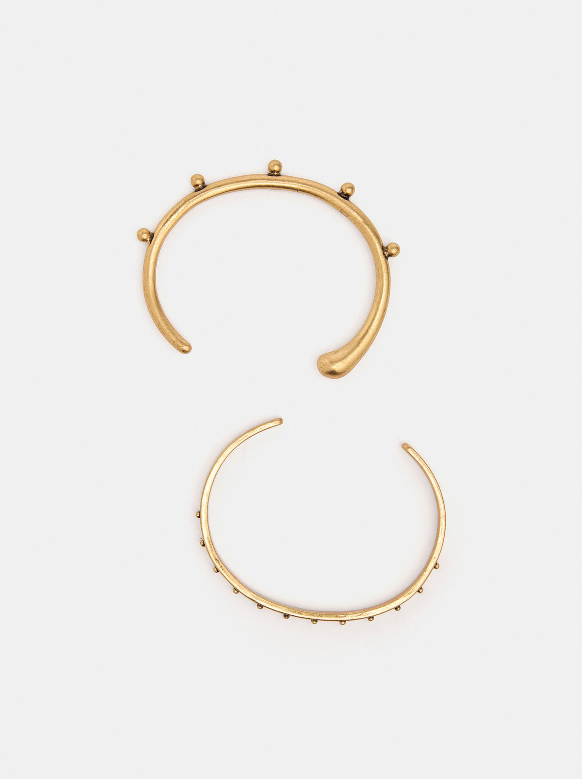 Set Of Rigid Bracelets With Beads