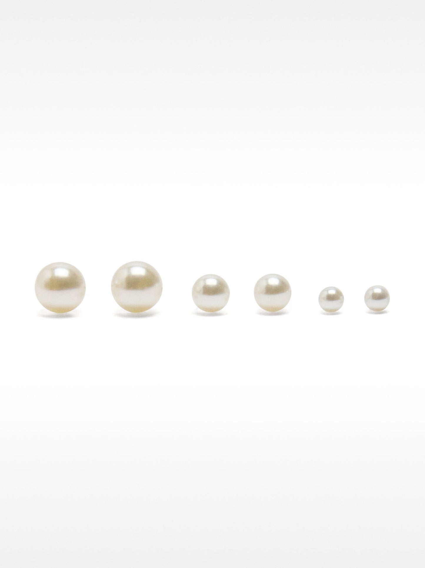 Set Of Faux Pearl Studs