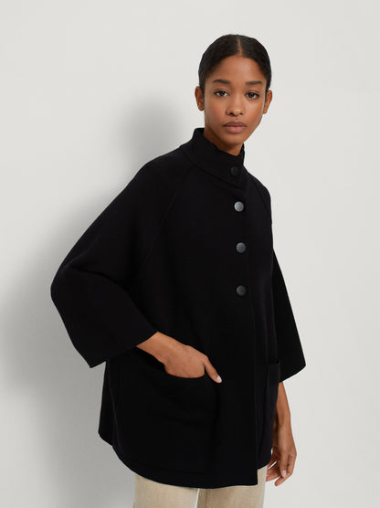 Knit Poncho With High Neck