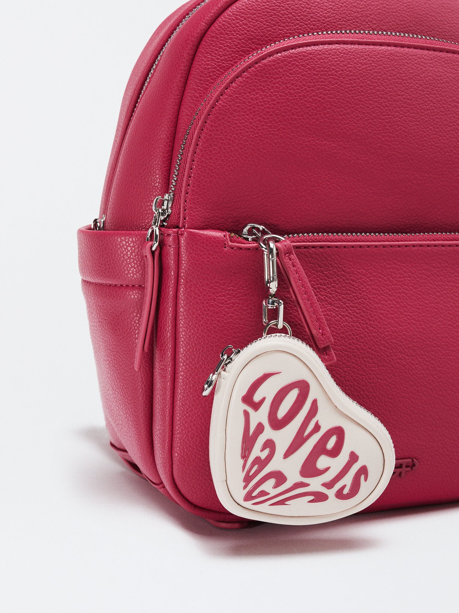 Backpack With Heart Pendant