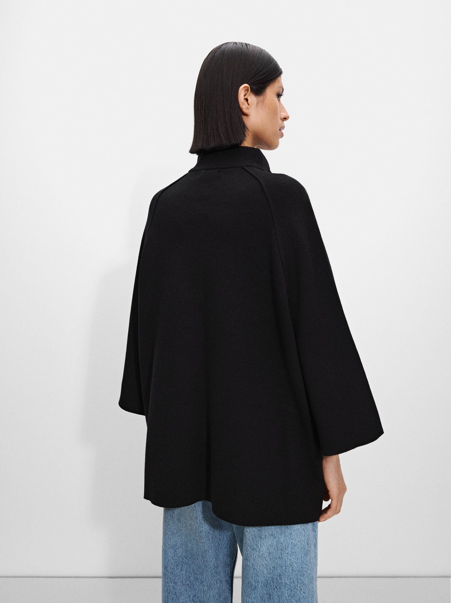 Knitted Poncho With Buttons