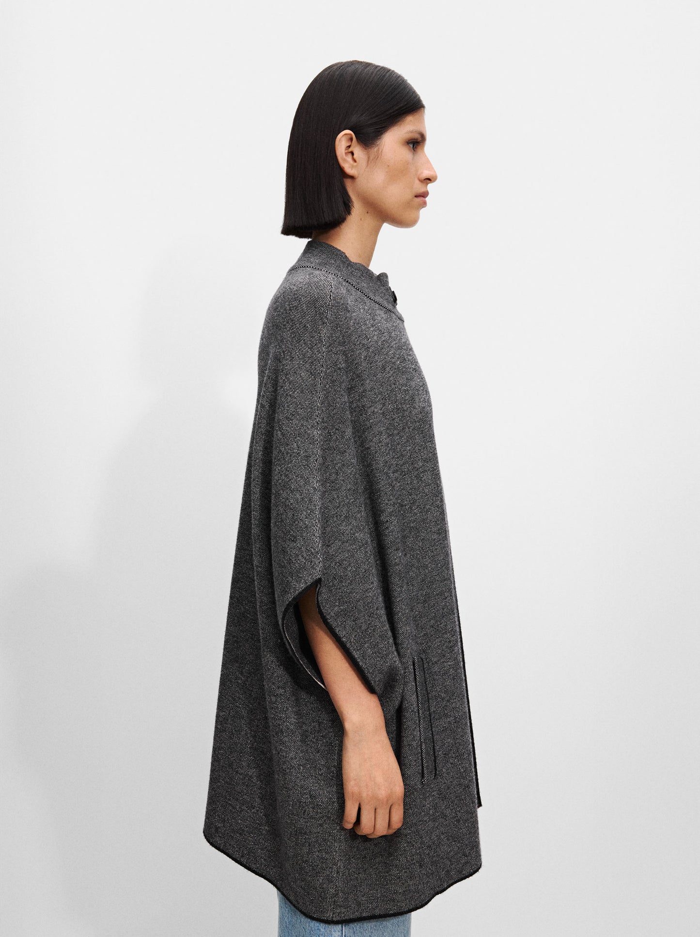 Knit Poncho With High Neck