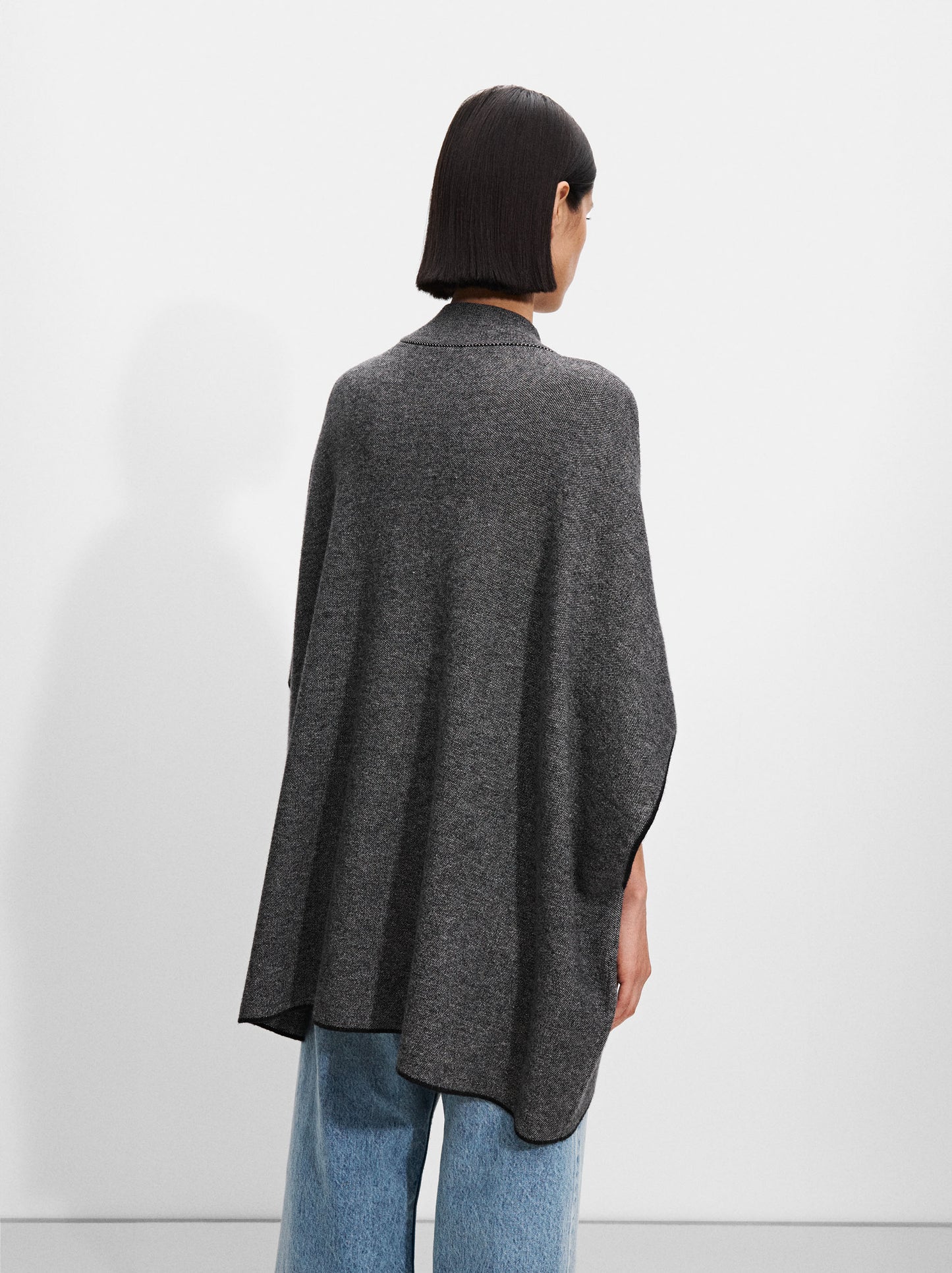 Knit Poncho With High Neck