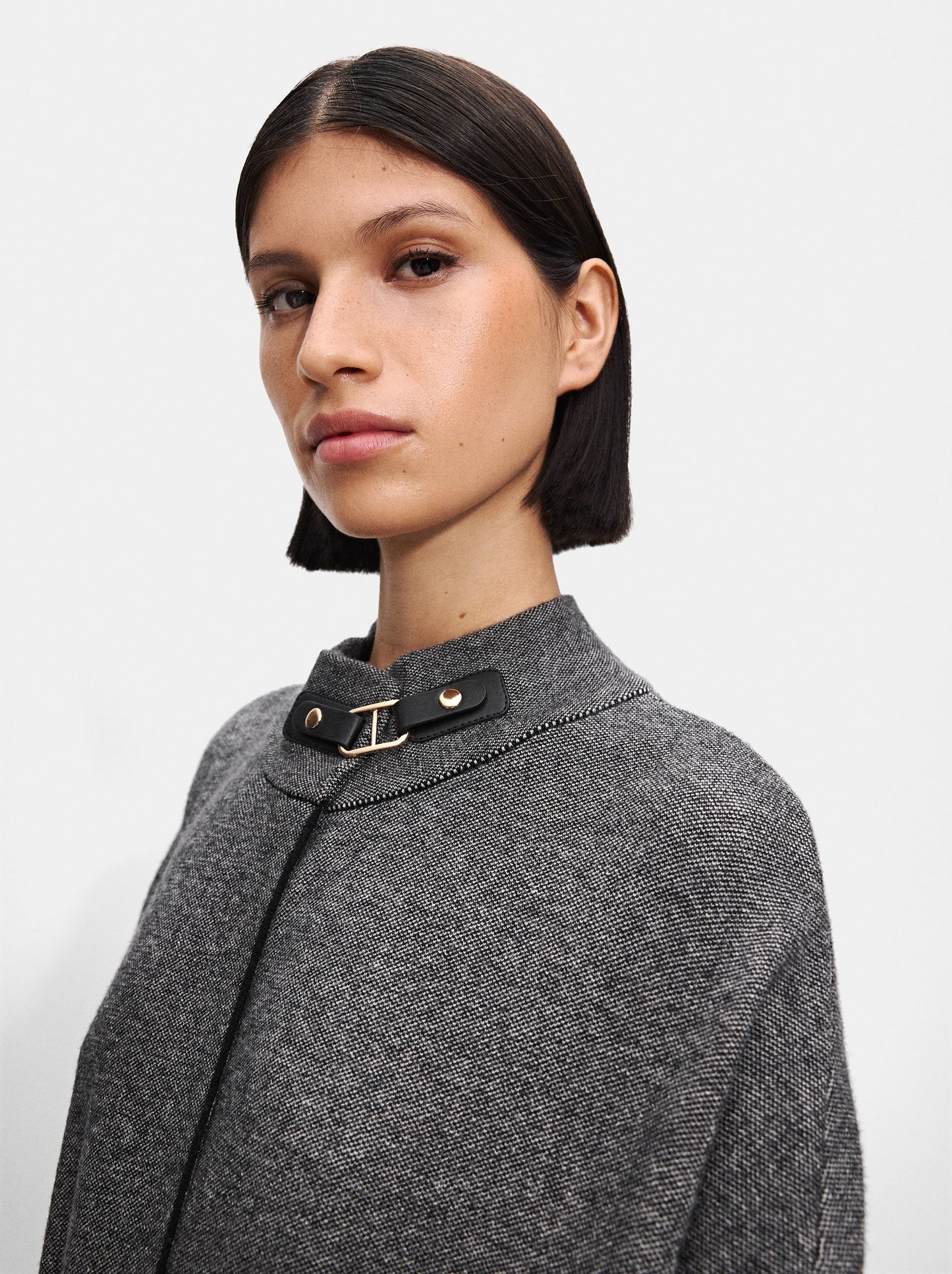 Knit Poncho With High Neck