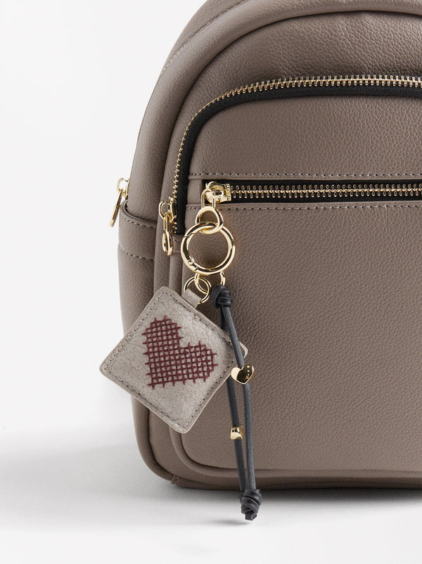 Backpack With Heart Pendant