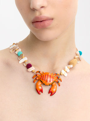 Short Necklace With Crab Shell Pendant