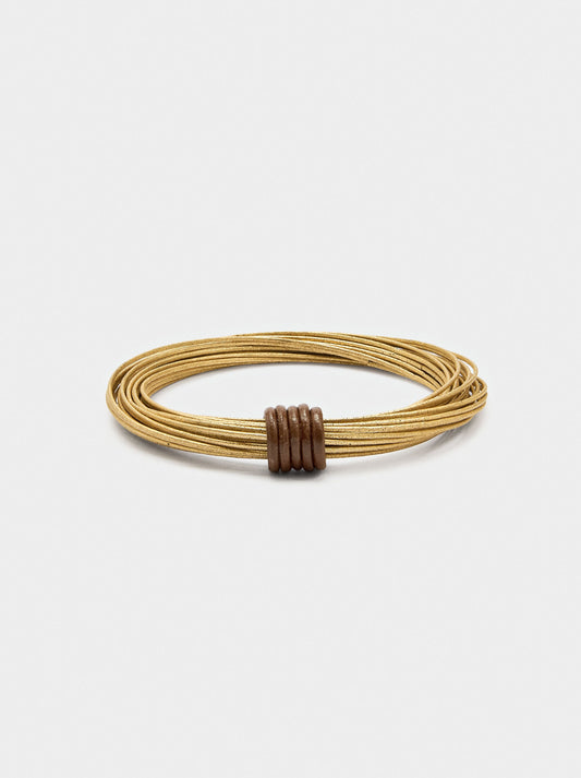 Rigid Bracelets With Criss-Cross Design
