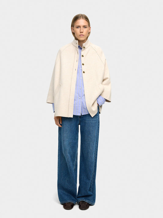 Knit Poncho With High Neck