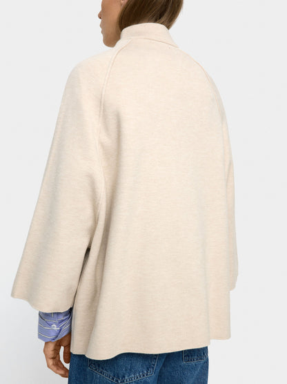 Knit Poncho With High Neck