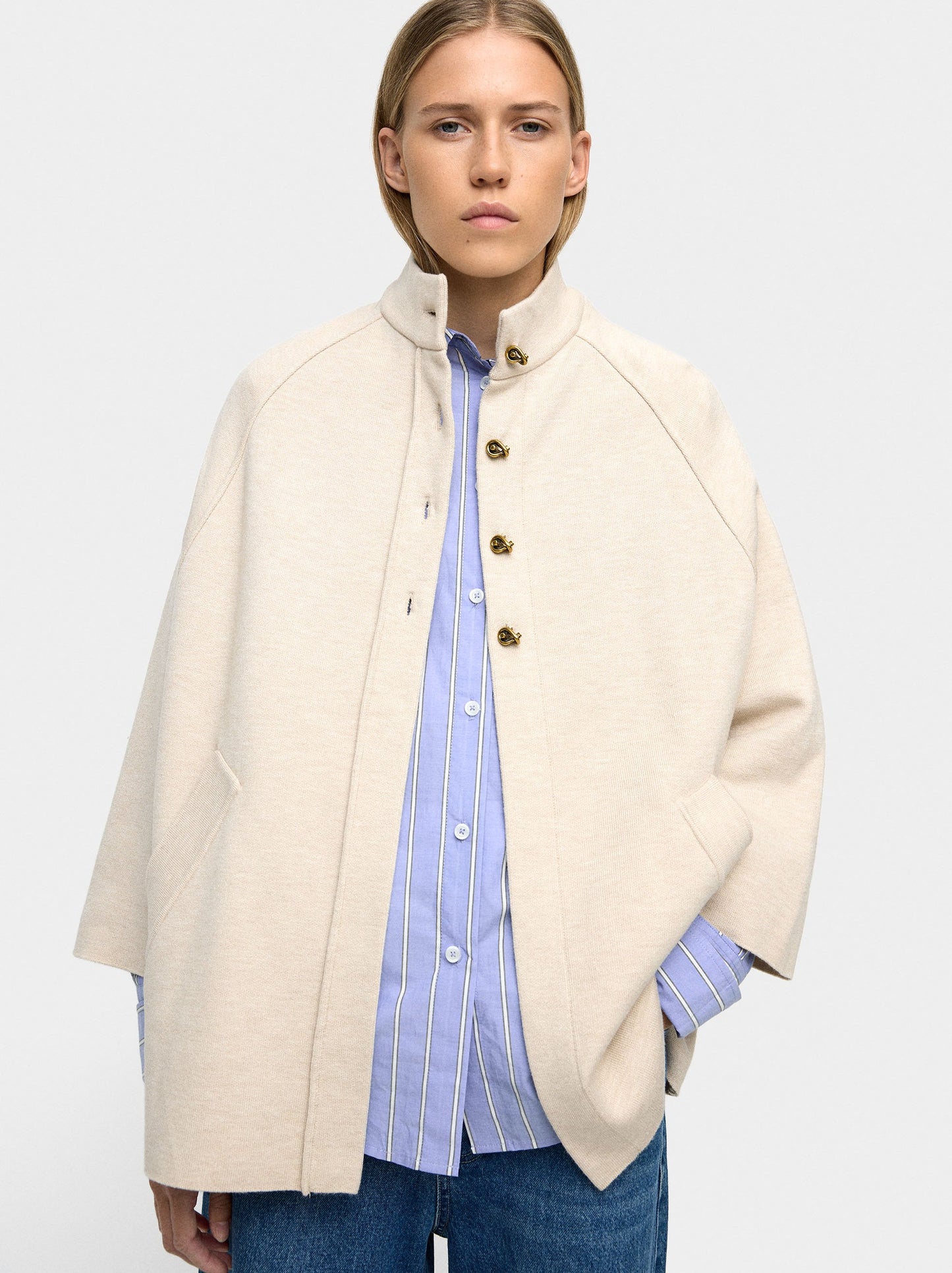 Knit Poncho With High Neck