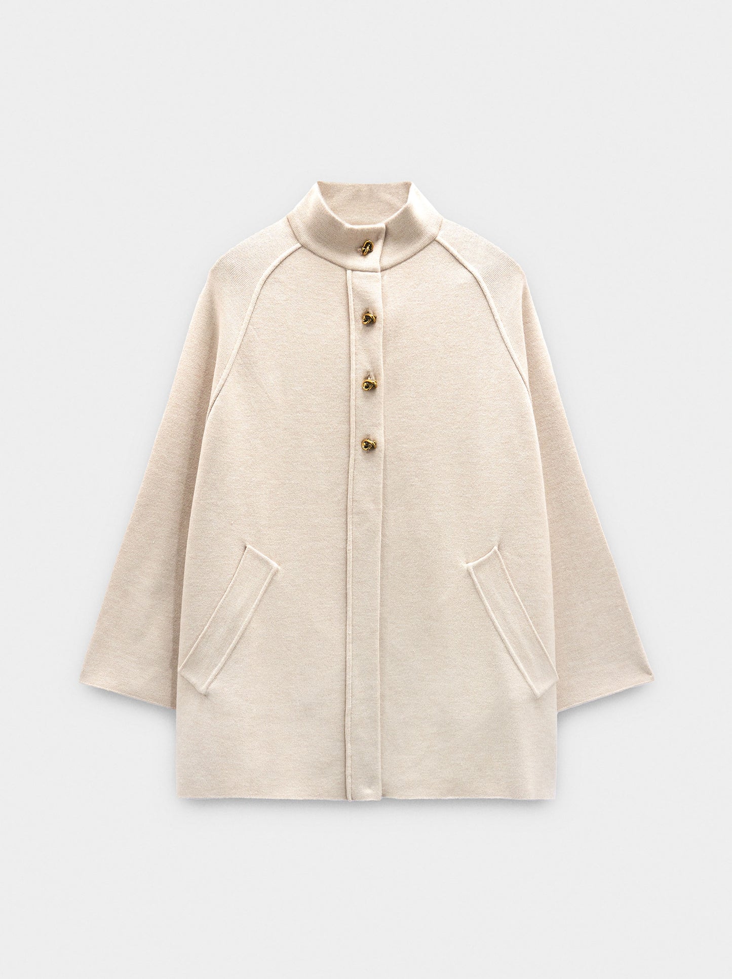 Knit Poncho With High Neck