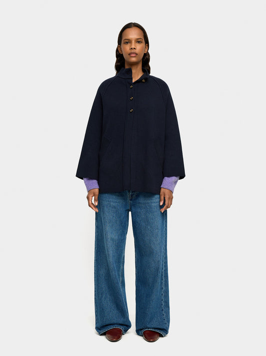 Knit Poncho With High Neck