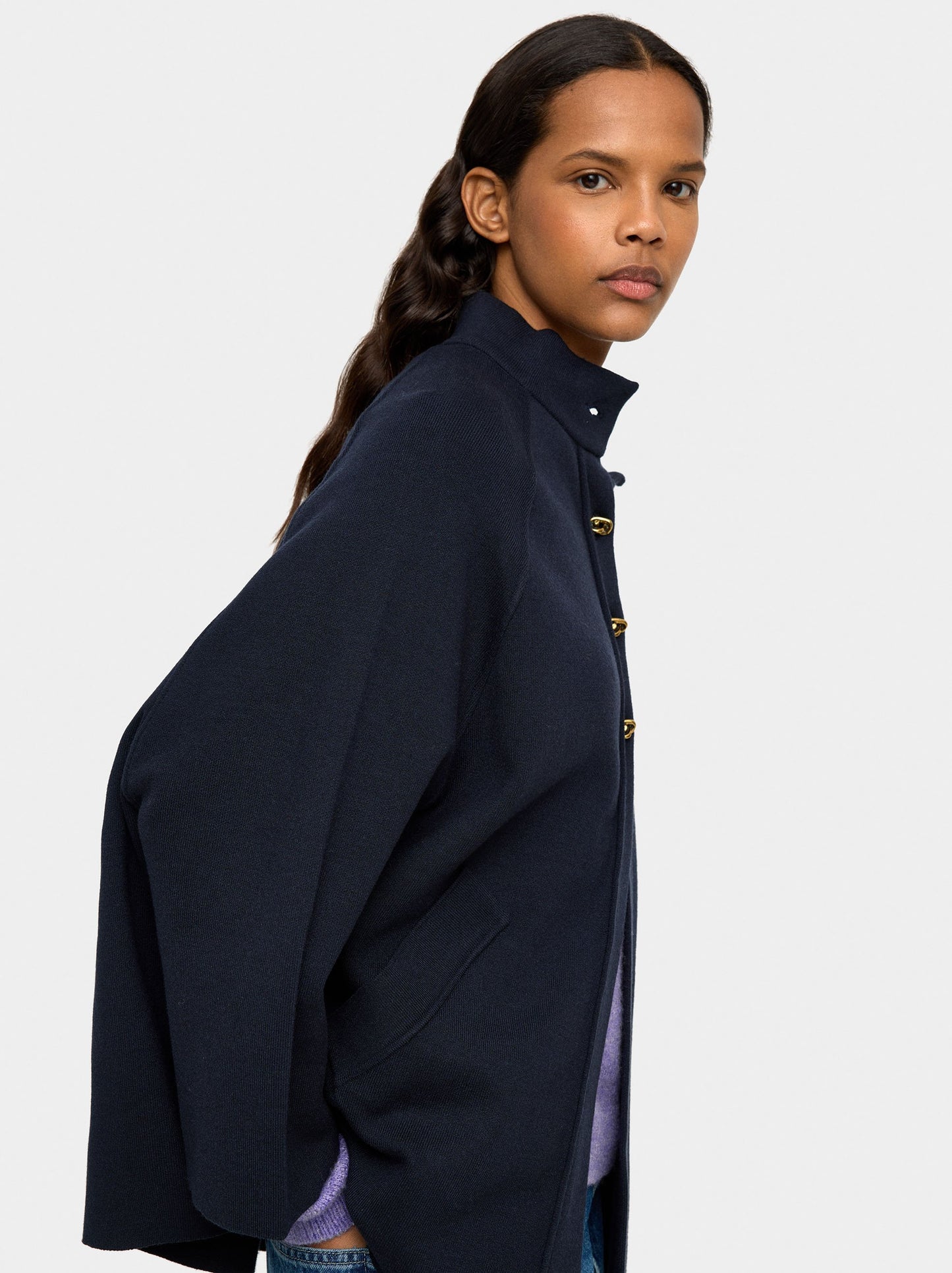 Knit Poncho With High Neck