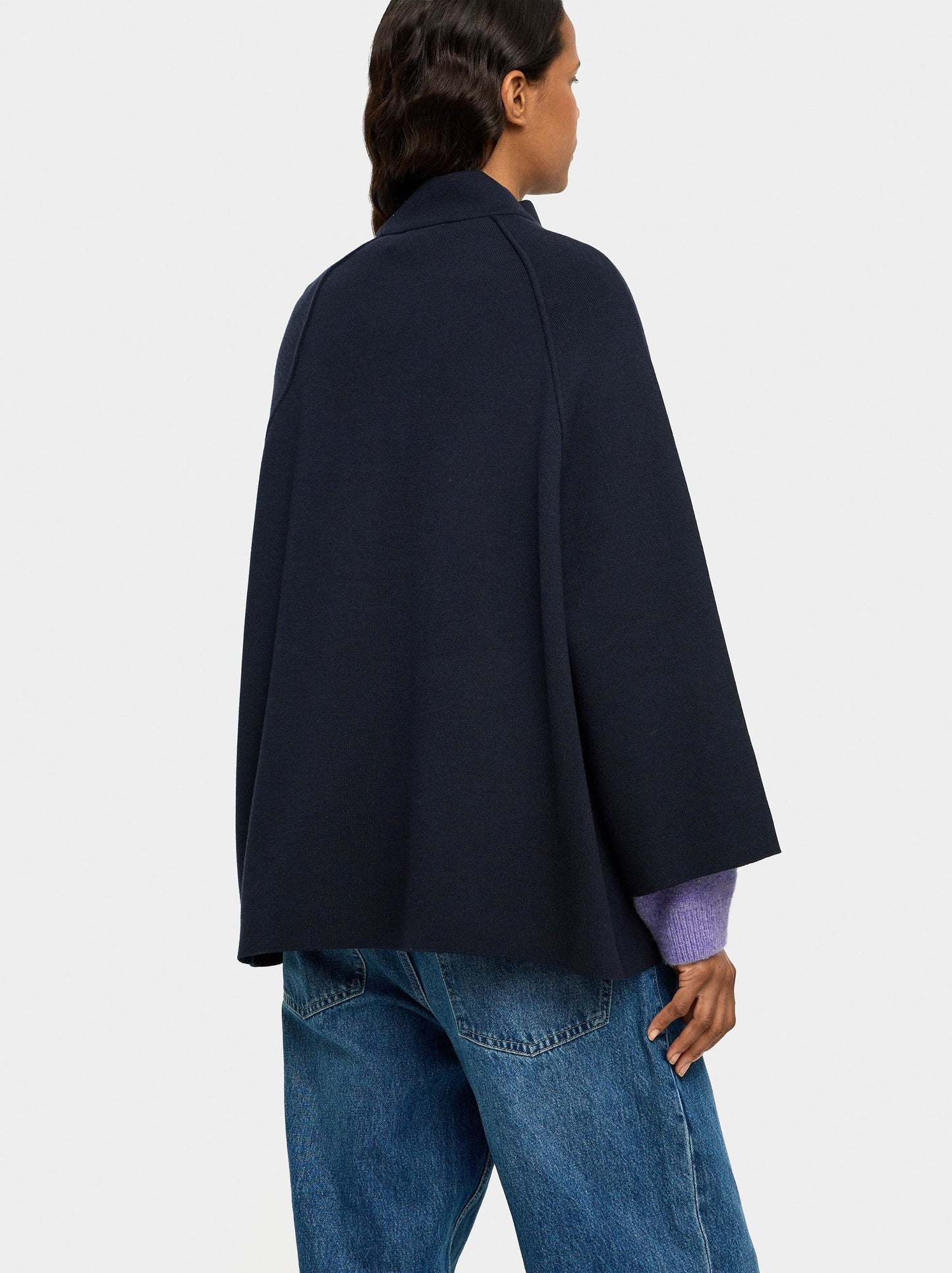 Knit Poncho With High Neck