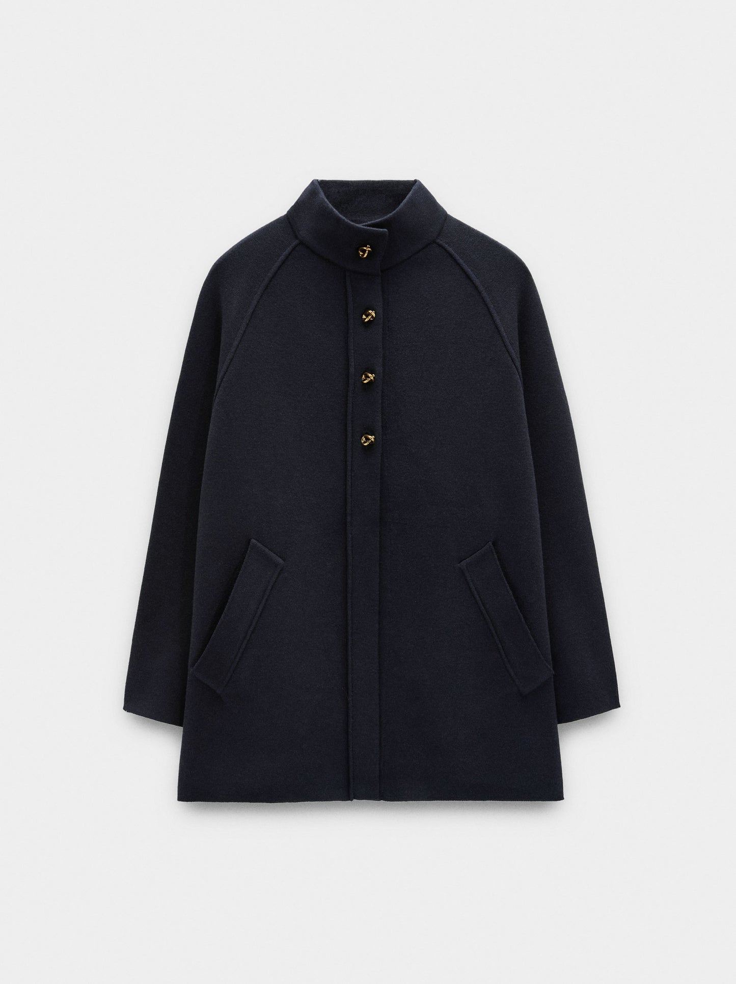 Knit Poncho With High Neck