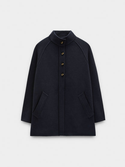 Knit Poncho With High Neck