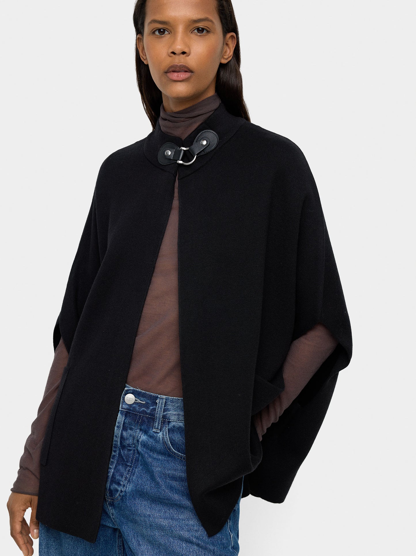 Knit Poncho With High Neck