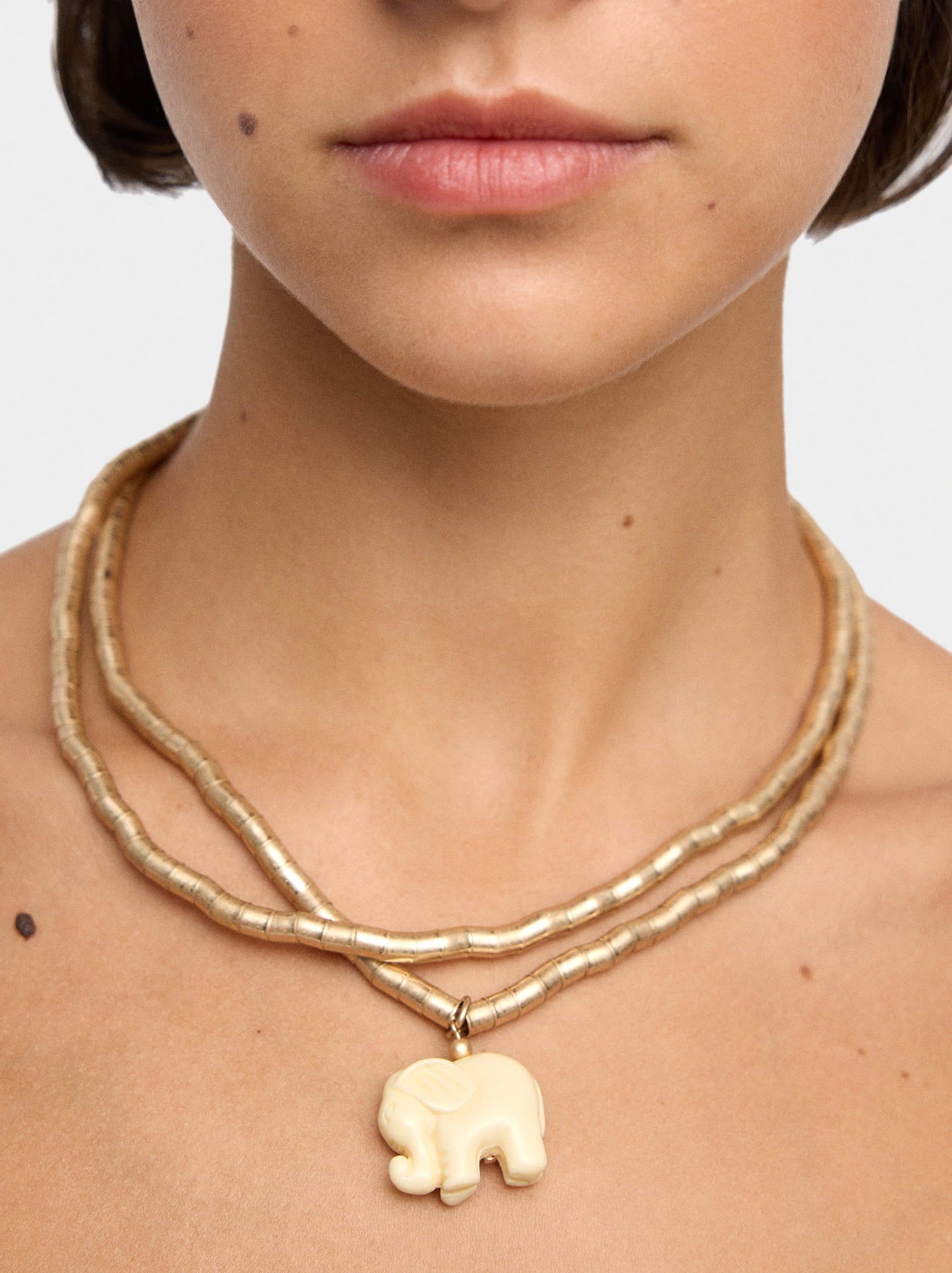 Set Of Short Necklaces With Elephant Pendant