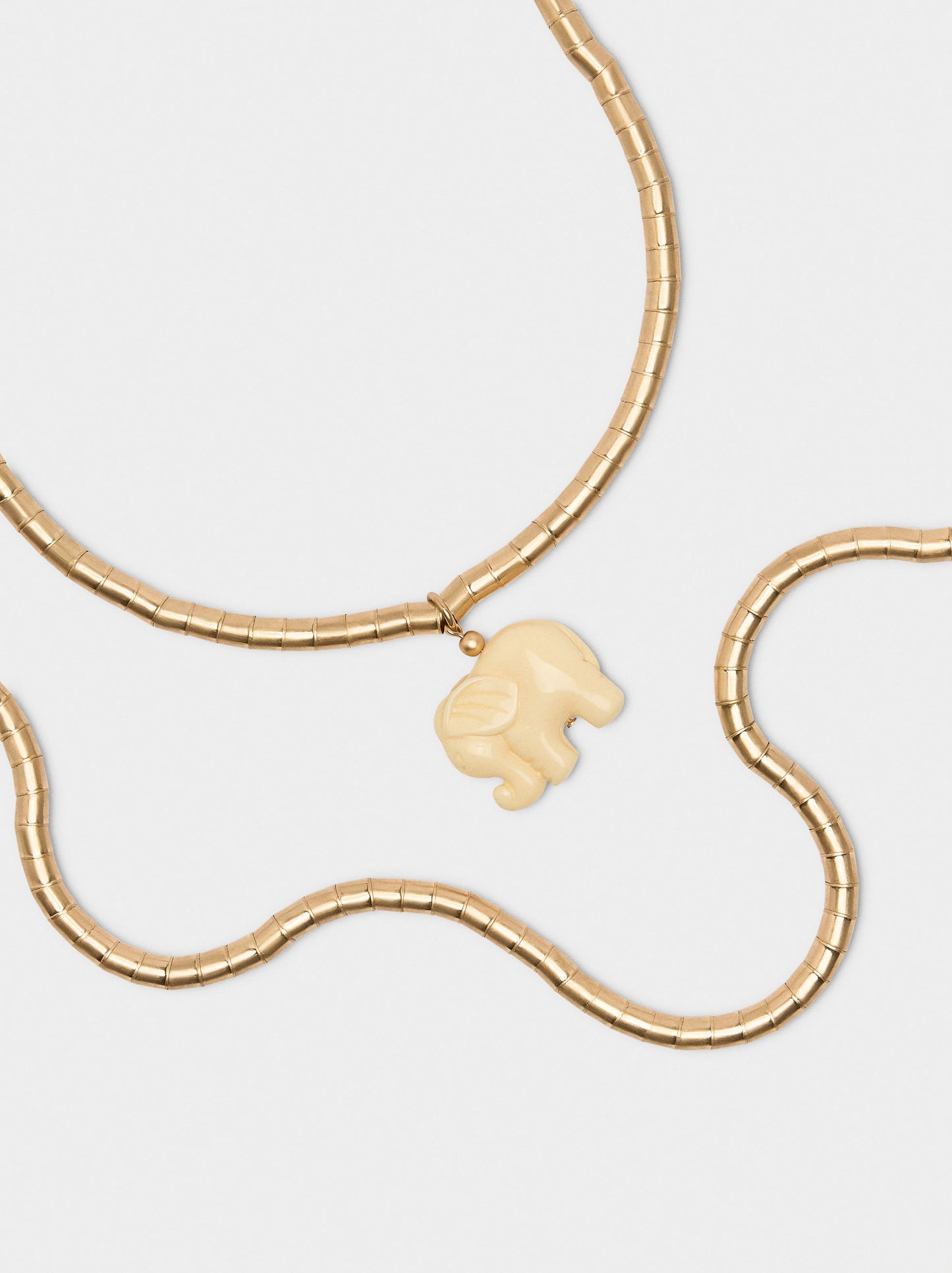 Set Of Short Necklaces With Elephant Pendant