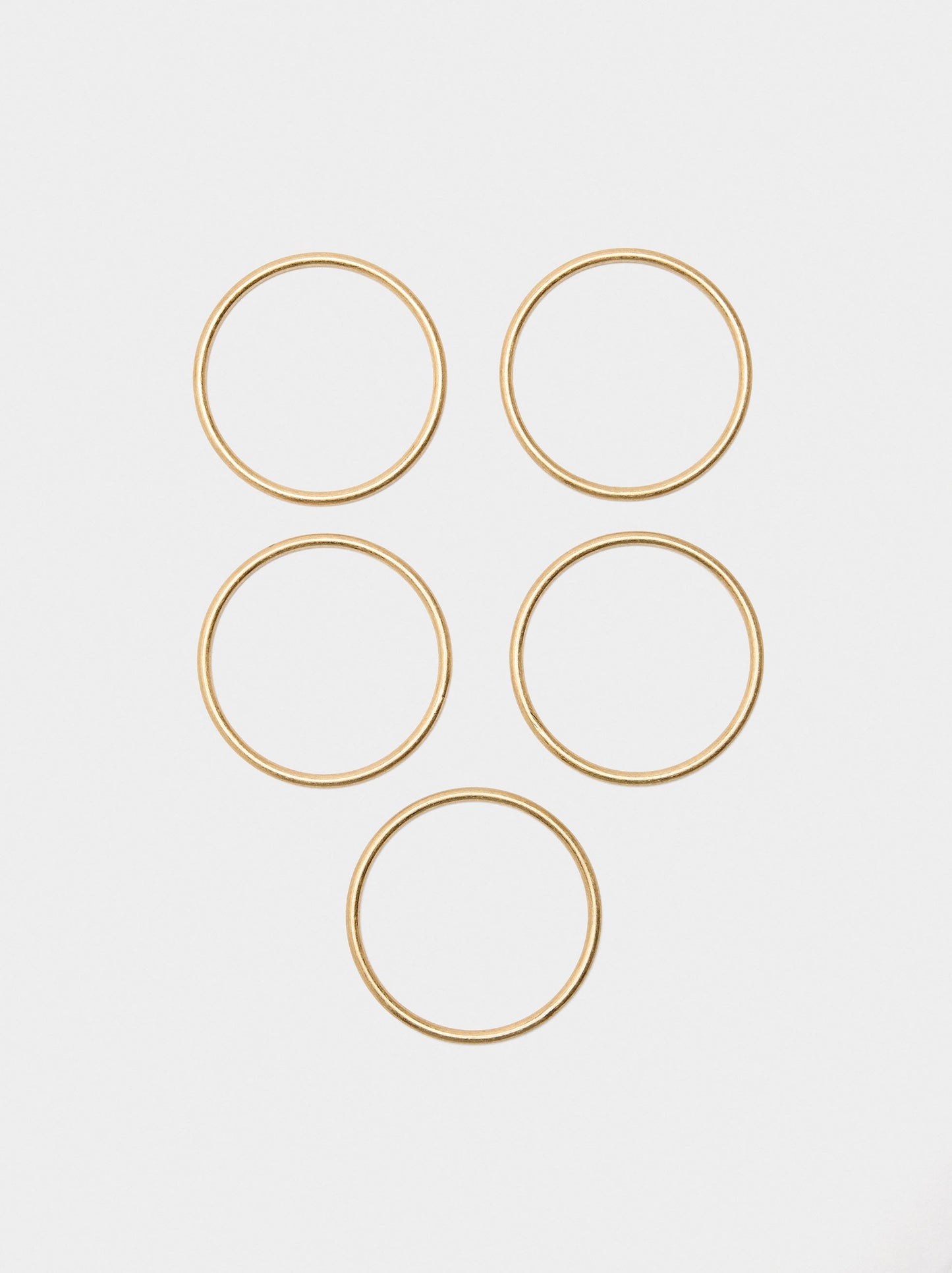 Set Of Five Rigid Golden Bracelets