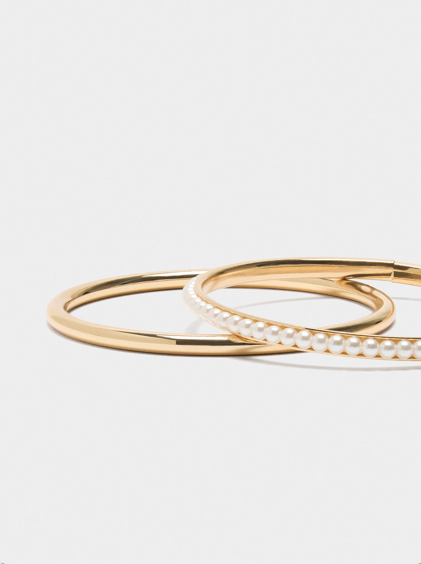 Set Of Rigid Bracelets With Pearls