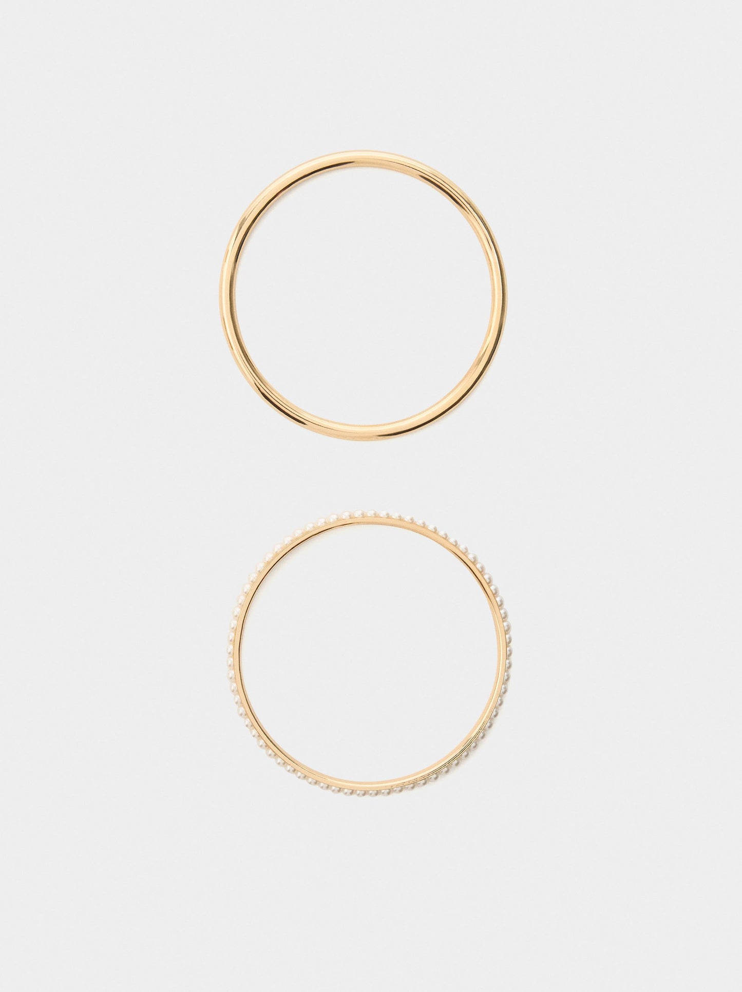 Set Of Rigid Bracelets With Pearls