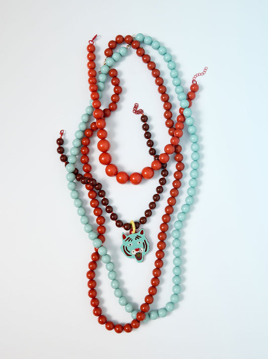 Necklace Of Beads With Tiger Pendant