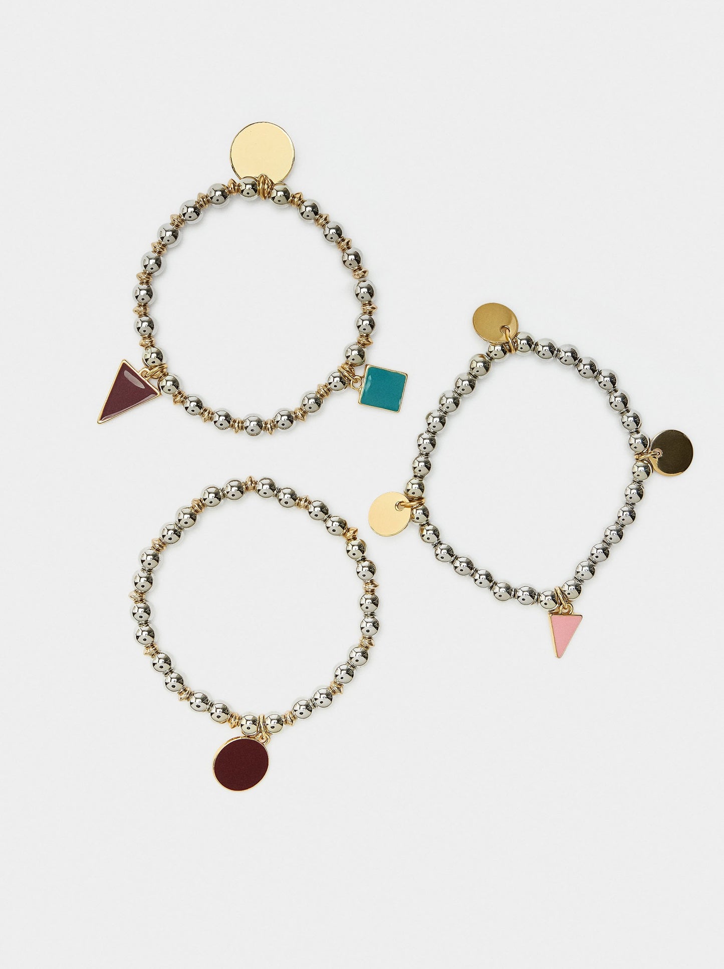 Set Of Elastic Bracelets With Charms