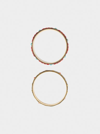 Set Of Rigid Bracelets With Colour Details