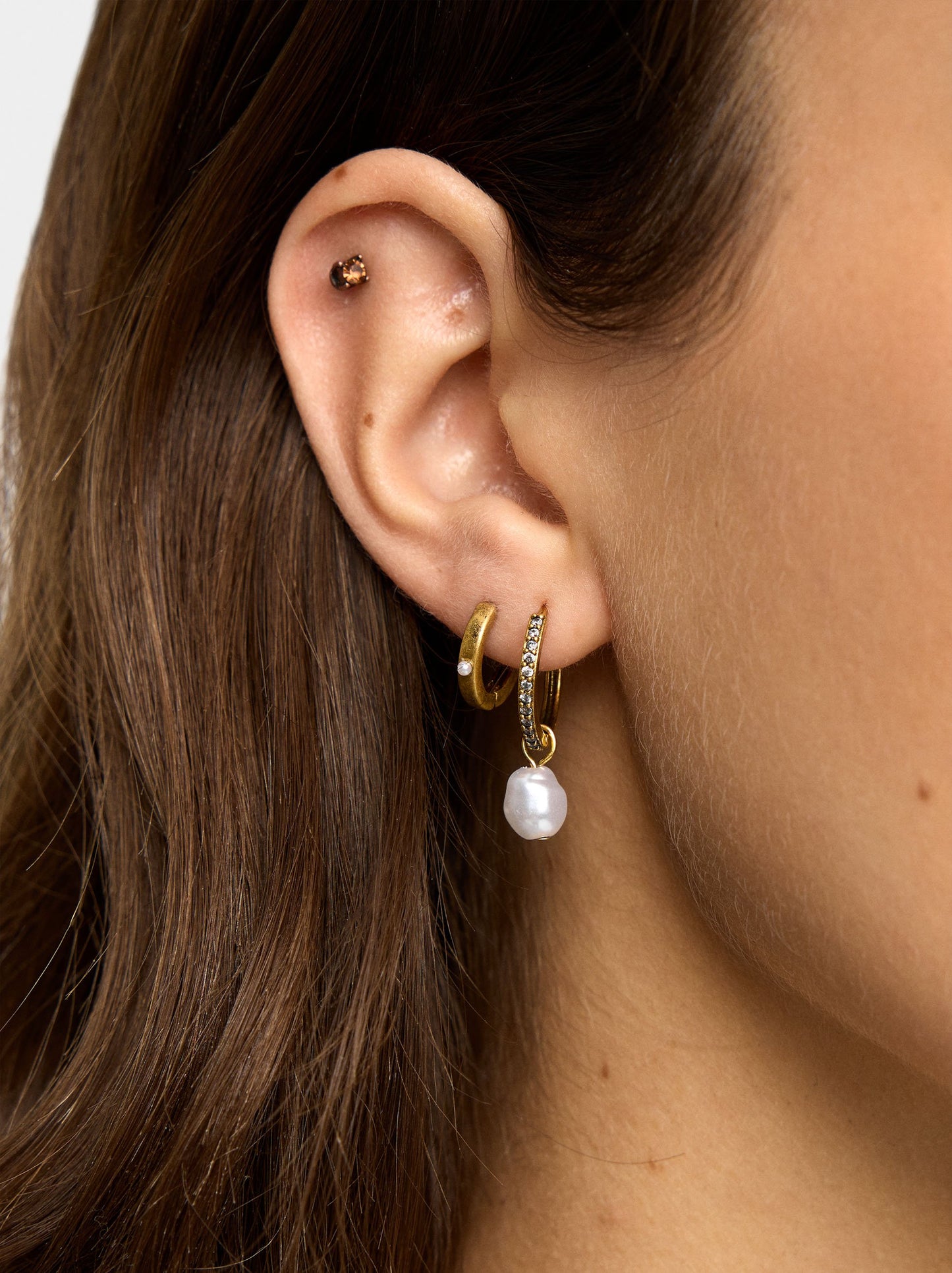 Set Of Earrings With Star And Pearl