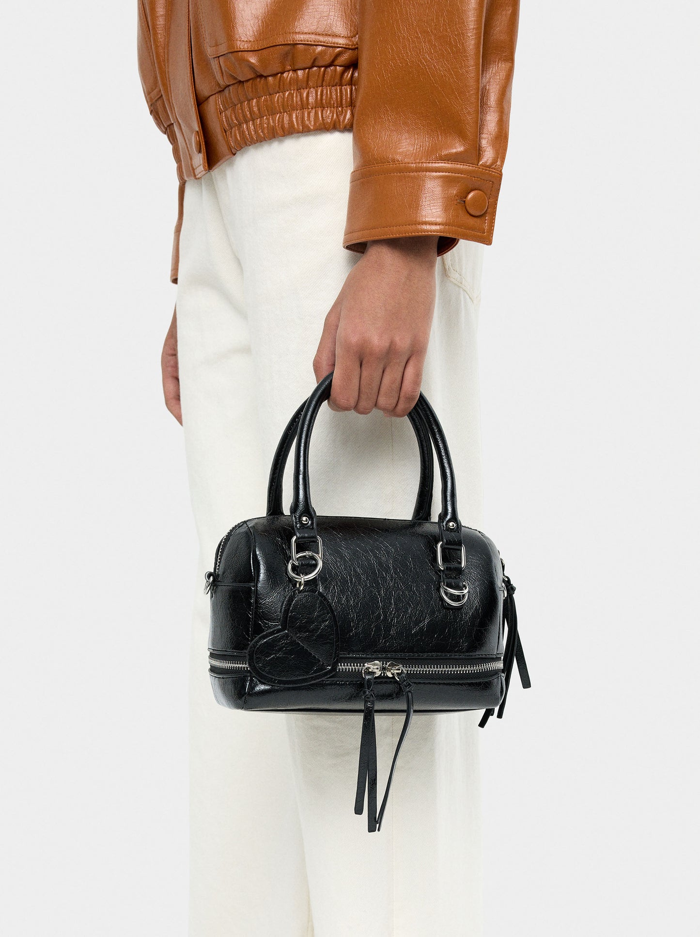 Tote Bag With Cracked Effect And Pendant