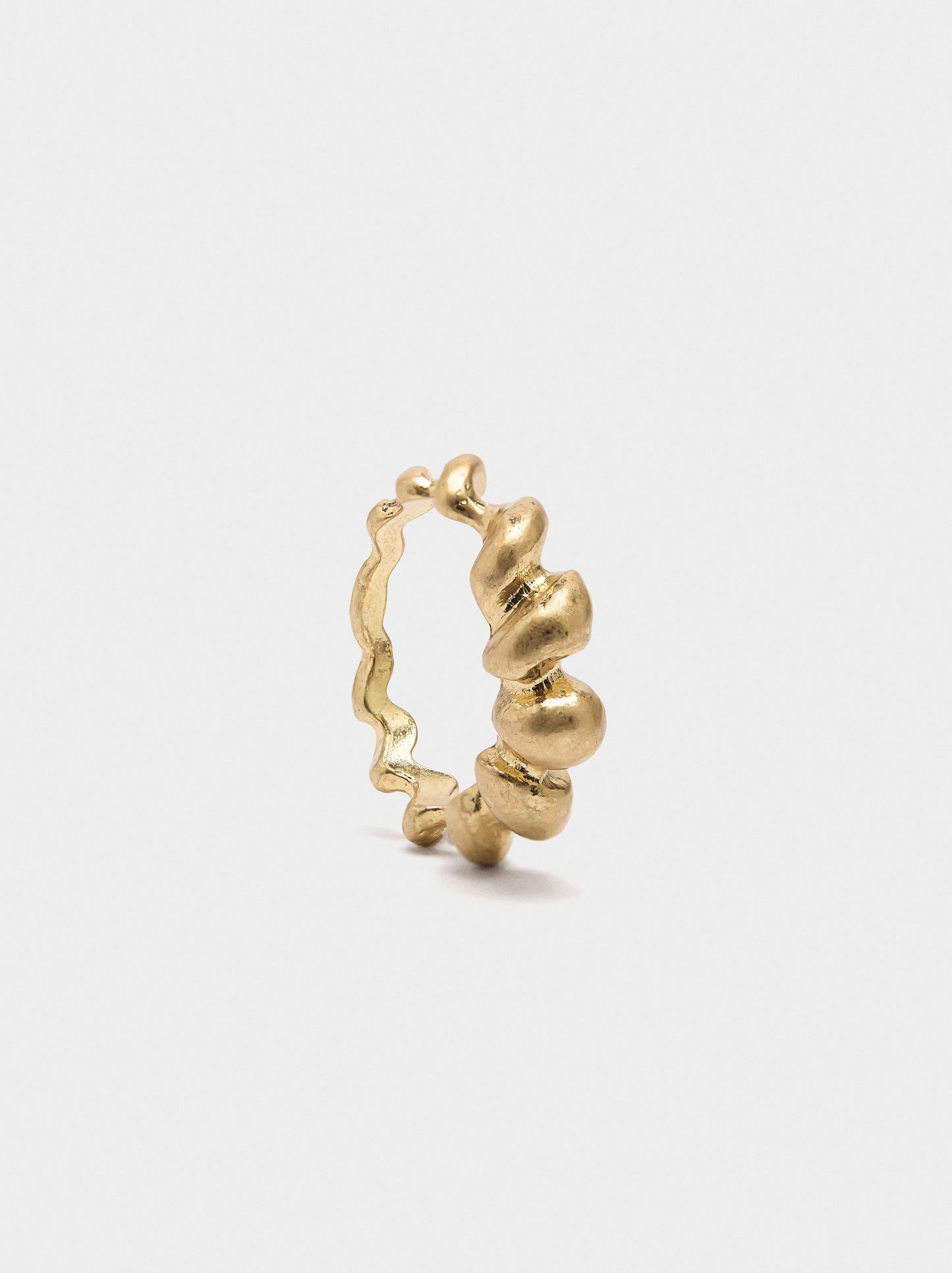 Ring With Rounded Reliefs