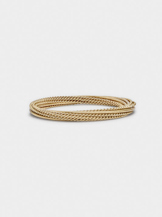 Set Of Bracelets With Smooth And Braided Designs
