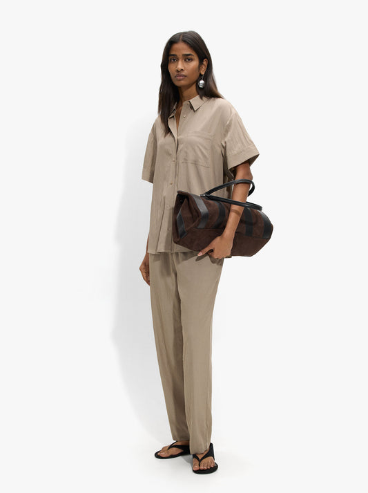 Trousers With Crinkled Effect And Elastic Waist