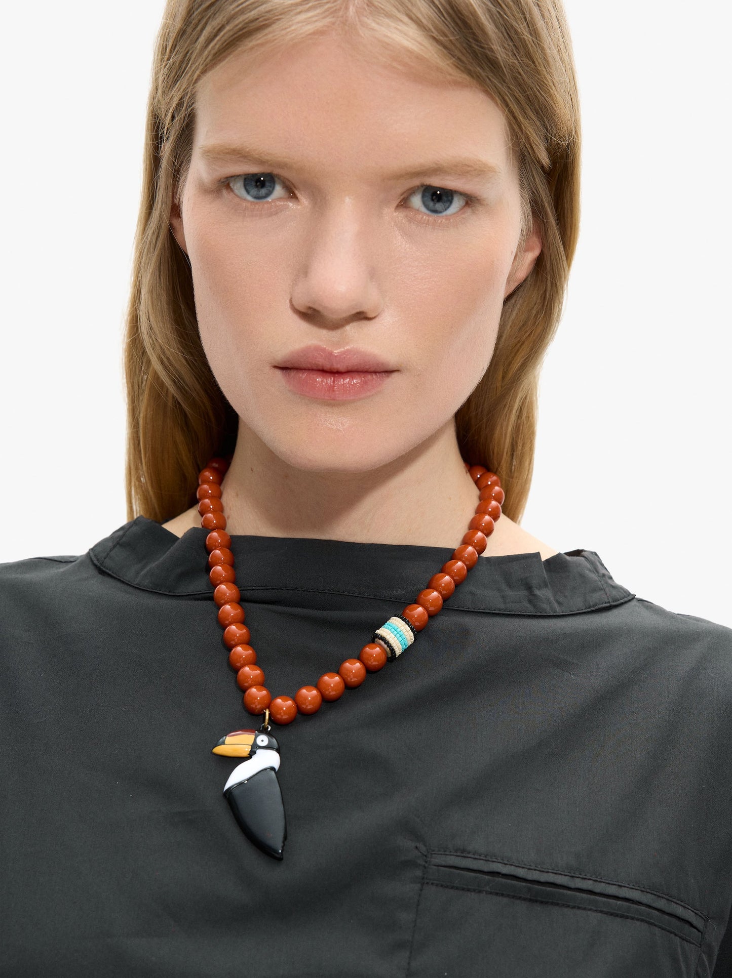 Short Necklace Of Beads With Bird Pendant